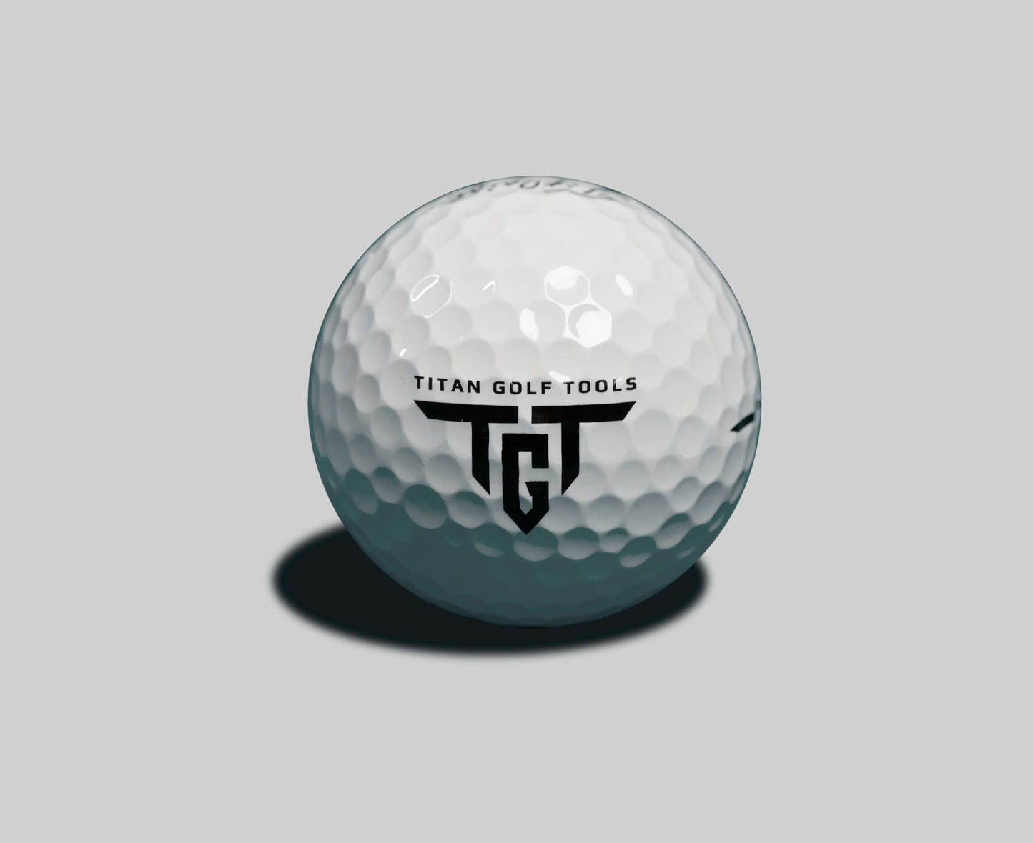 Titleist Pro V1 golf ball with TGT Titan Golf Tools logo