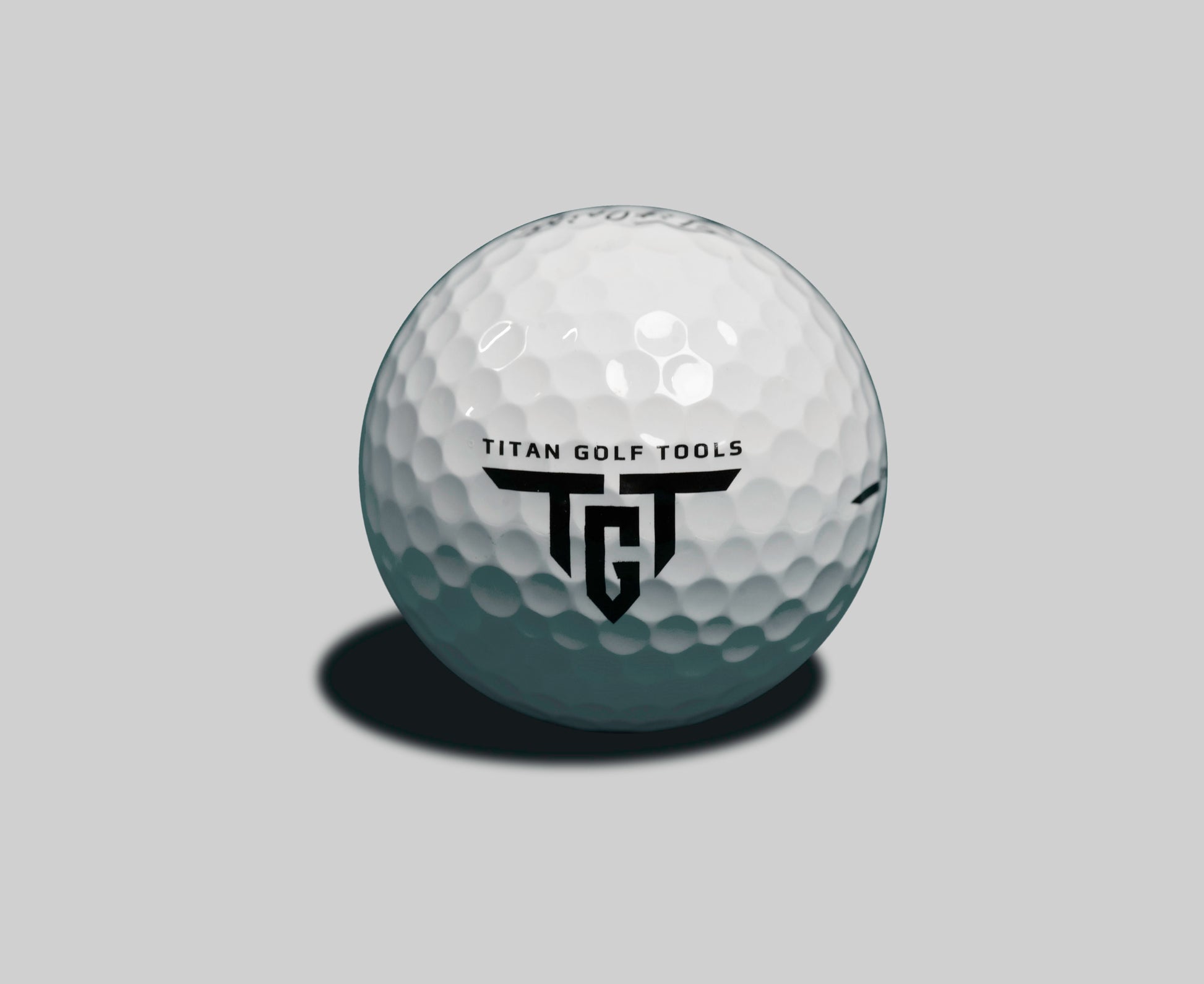 Titleist Pro V1 golf ball with TGT Titan Golf Tools logo
