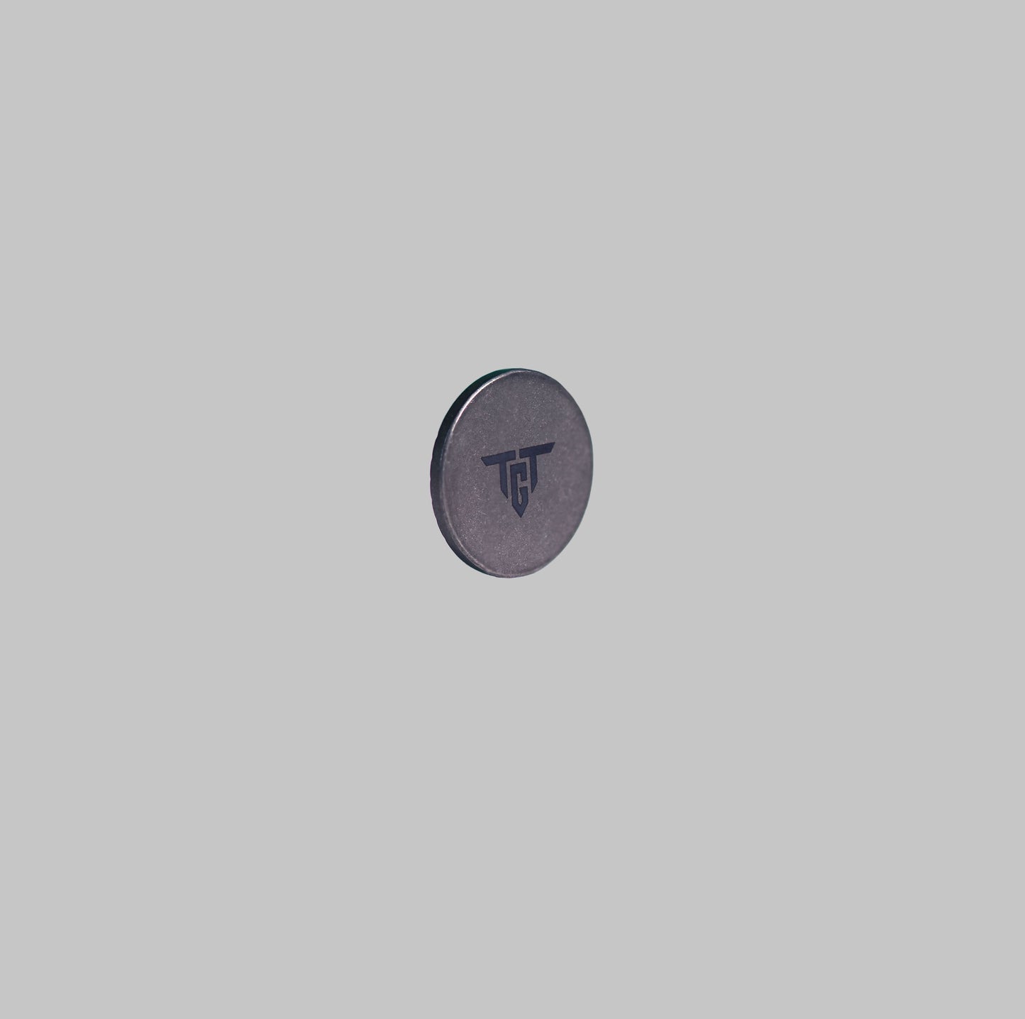 Ti MARKER titanium golf ball marker front angled view by Titan Golf
Tools