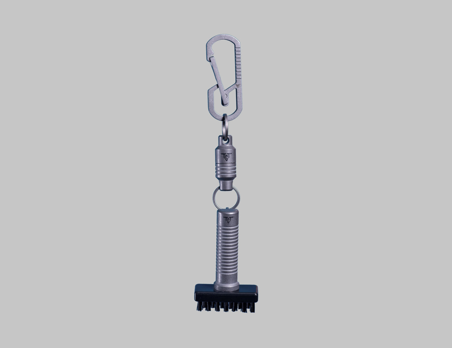Ti LINK titanium carabiner attached to Ti BRUSH golf club brush